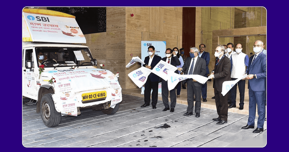 SBI Chairman Flagged off essential items for further distribution by an NGO