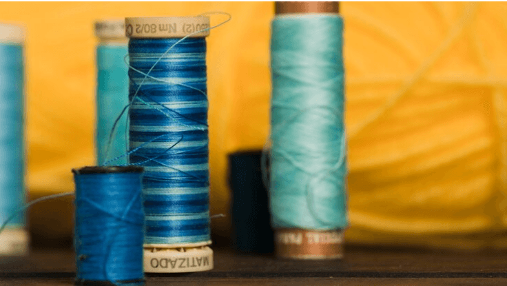 NTCL’s skilled technicians ensuring high standards of fabric production and finishing.