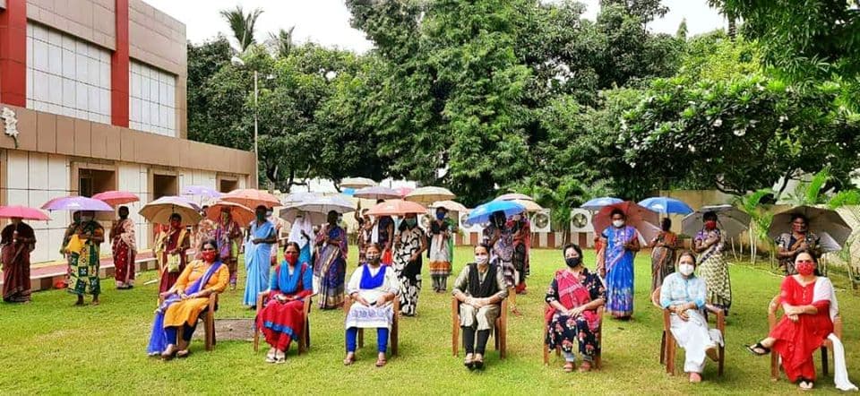 MCL Distributes Umbrellas To The Needy