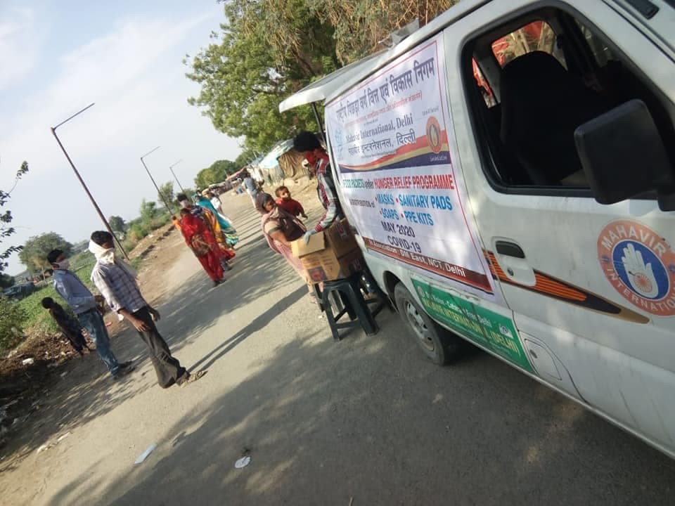 NBCFDC distributed 1875 food packets to poor needy people 