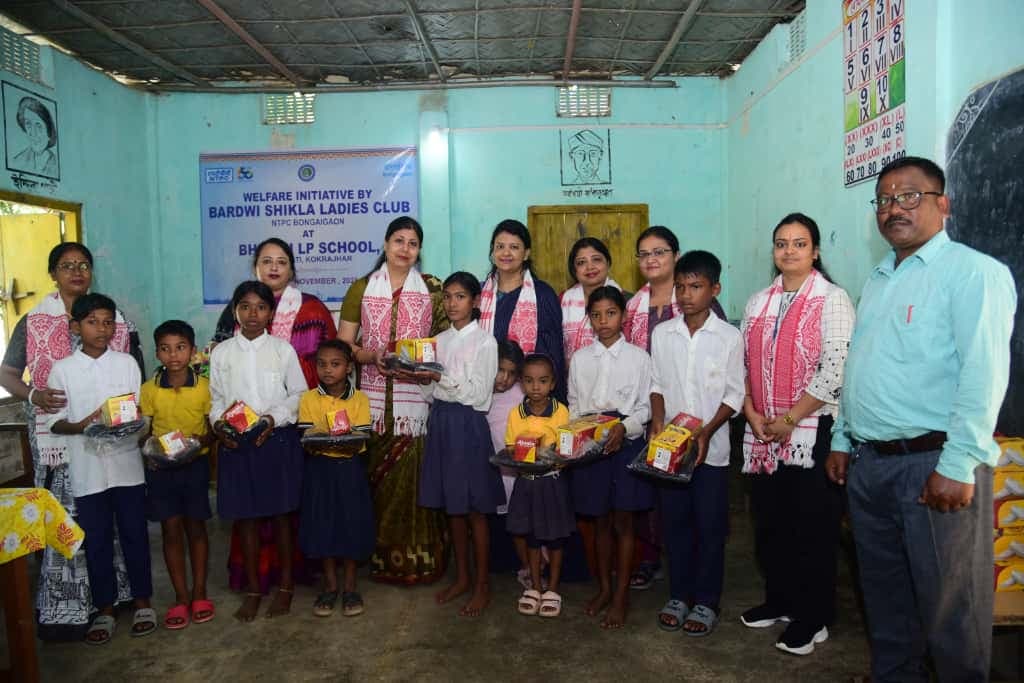 NTPC Bongaigaon, Bardwi Shikla Ladies Club distributed warm sweaters and school shoes