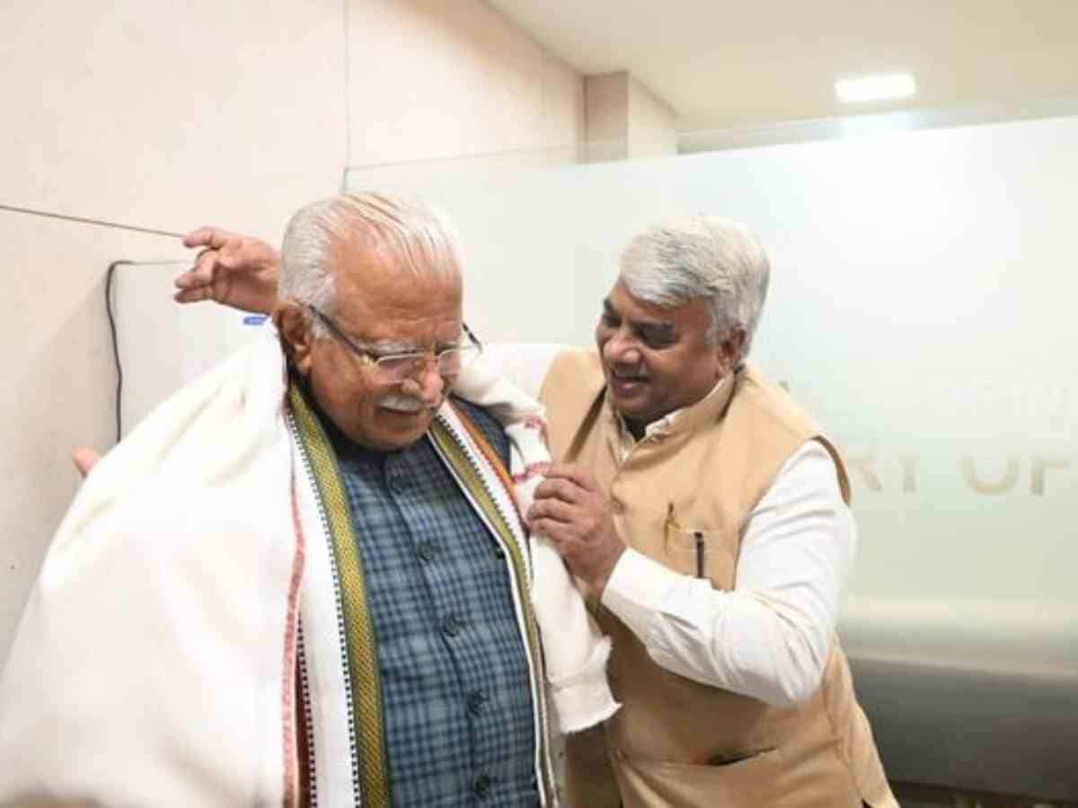 NHPC CMD felicitates Power Minister Manohar Lal Khattar