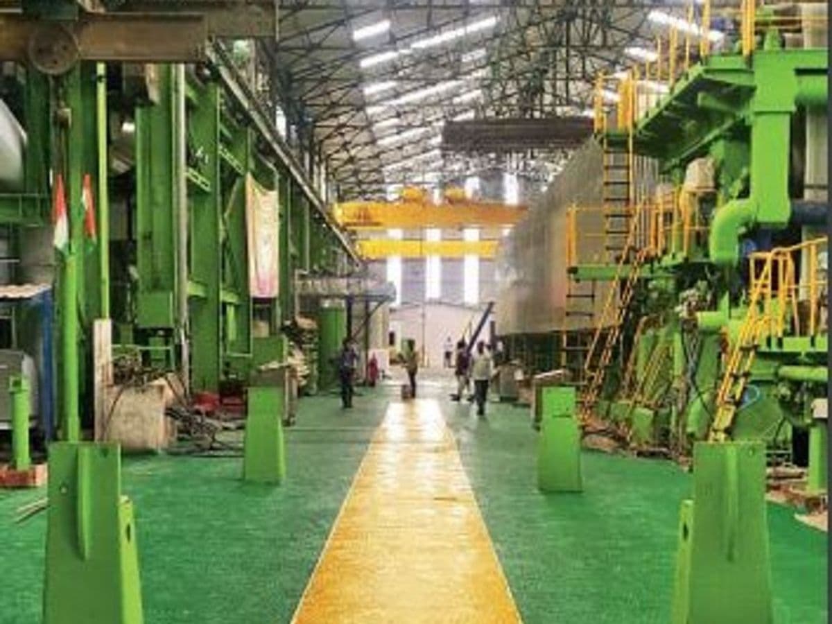 NEPA Ltd technicians ensuring rigorous quality checks to maintain the high standards of their paper products.