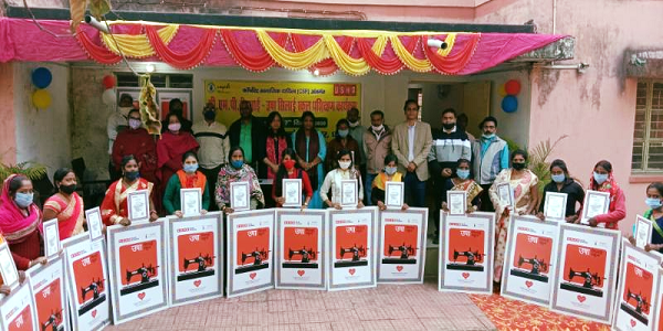 CMPDI providing training to women in tailoring in its CSR activity
