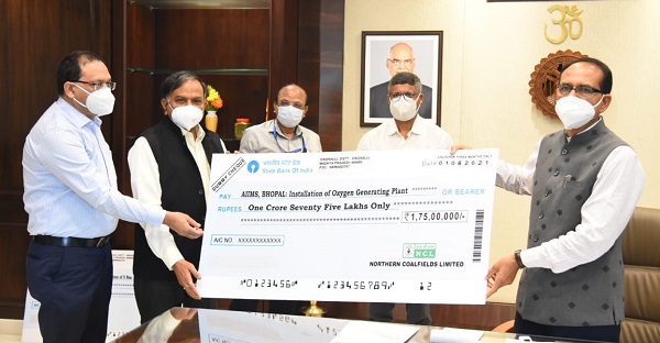 NCL CMD handed over Rs 10 Crore cheque to MP Government to fight against COVID