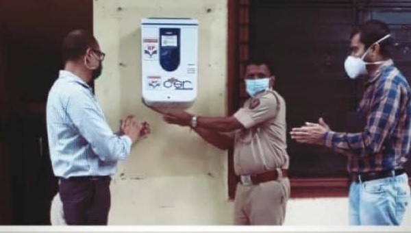 HPCL distributed automatic hand sanitizer dispenser to Police Station