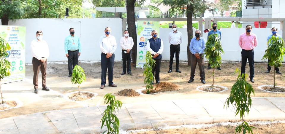 Shri Ranjan Kumar Mohapatra Director planted saplings near IndianOil office