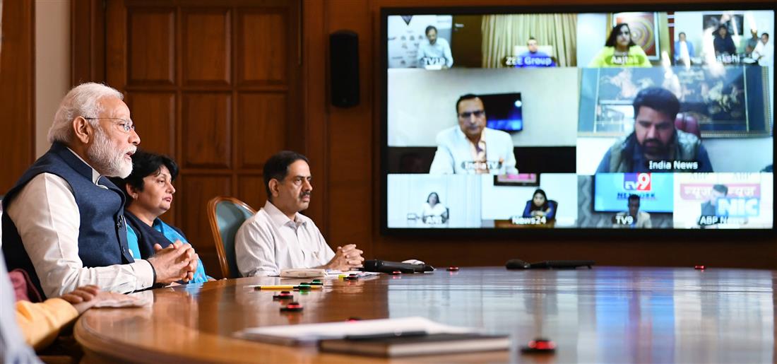 Shri Narendra Modi interacting with the key stakeholders