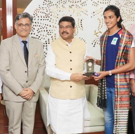 Union Steel Minister Shri Dharmendra Pradhan felicitates PV Sindhu suggests her to lend voice to National Missions