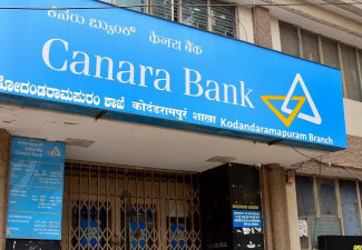 Canara Bank handed over a dividend cheque of RS 2,283.41  Crore to the Government of India