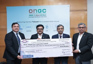ONGC Subsidiary Petronet MHB presented interim dividend cheque to ONGC Director (Finance)
